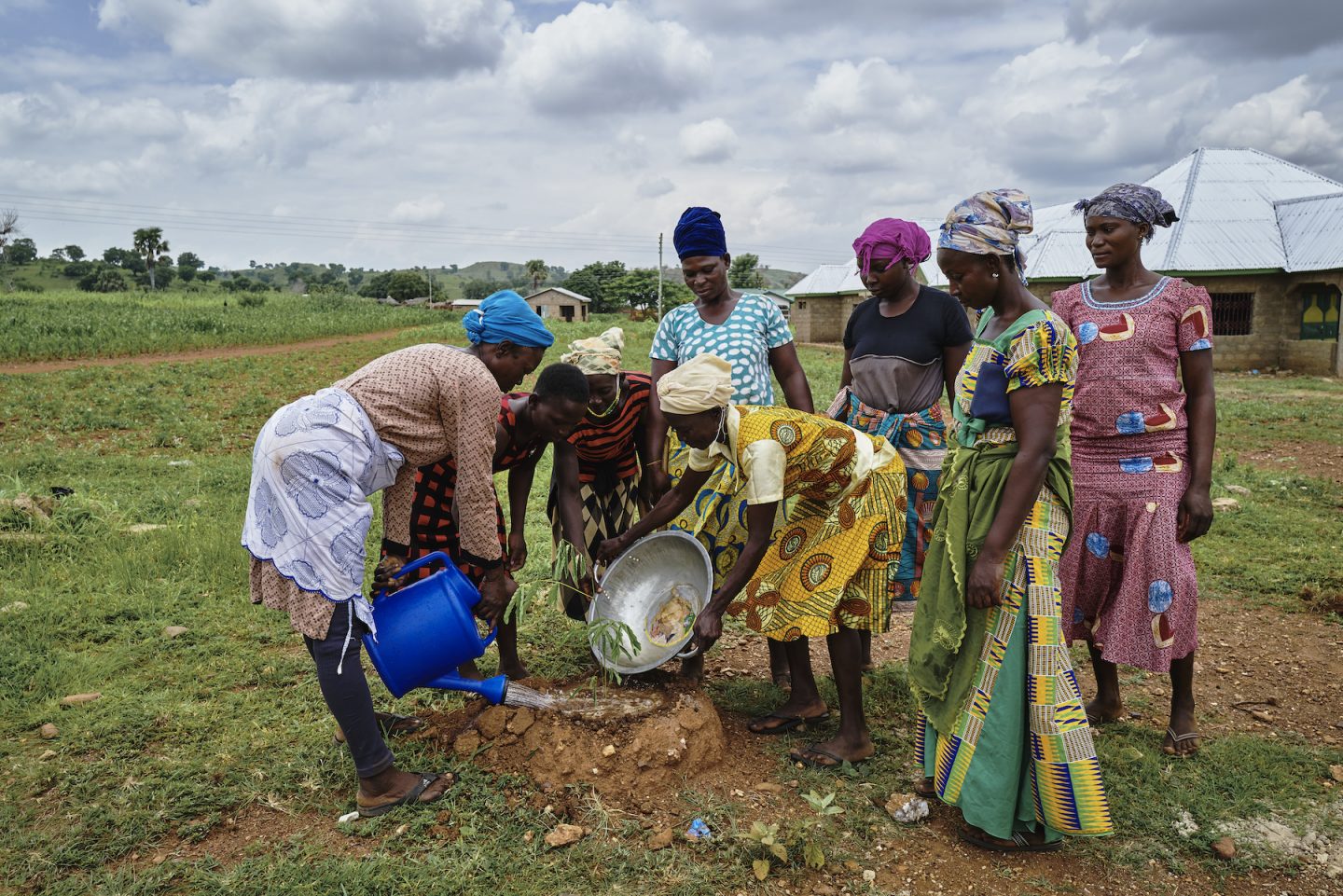 Ugandan women planting tree