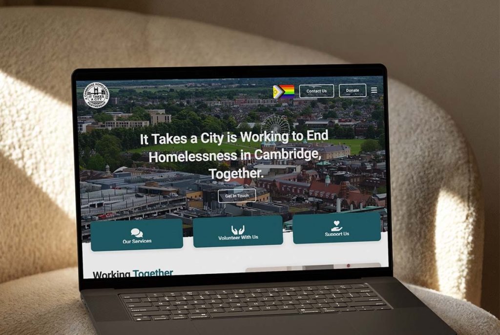 It Takes A City website on a laptop